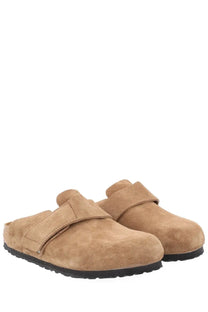 Birkenstock unisex mule loma brown tan suede clogs with black rubber sole and velcro strap shown from the back