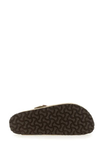 Birkenstock unisex sabot Boston beige with a brown rubber sole wavy pattern beige upper and metallic buckle