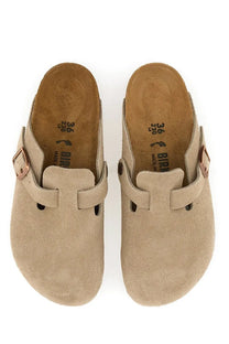 Beige suede birkenstock unisex sabot boston clogs with rose gold buckle straps in a side view
