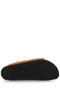 Birkenstock unisex sandal arizona brown in tan cork with a black rubber sole and distinctive wavy tread pattern