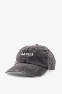 Dark gray washed cotton baseball cap with white embroidered bonsai lettering for men’s vintage style