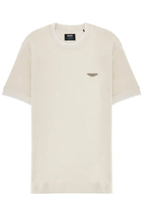 Cream-colored boss men’s t-shirt with a subtle metallic wing logo on the left chest from Aston Martin collection