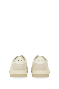 Cream-colored suede BOSS men’s Baltimore Tenn sneaker with minimalist design and subtle heel branding back view