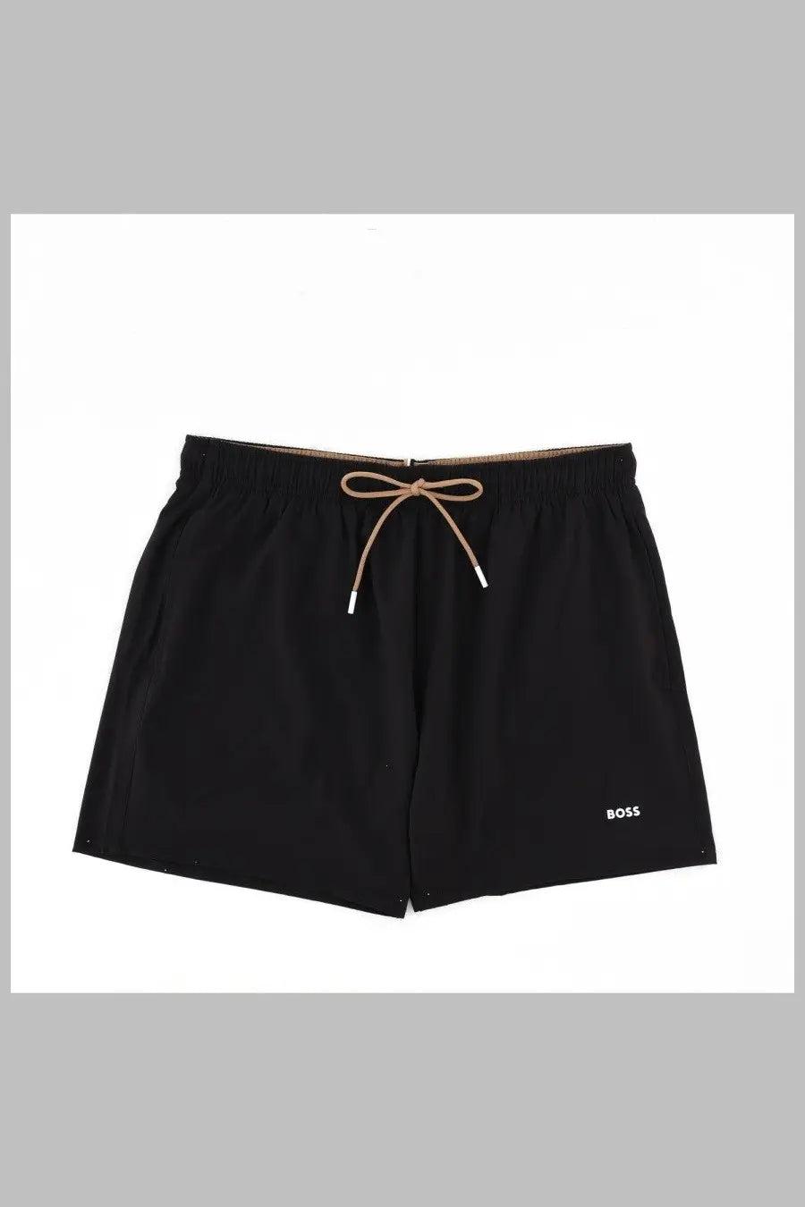 Boss men’s black swim trunks with beige drawstring and white aglets designed for beach and pool use