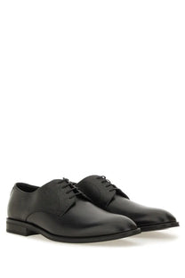 BOSS men’s black leather derby loafer featuring lace-up design and subtle textured panel on the vamp