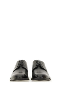 BOSS men’s black leather derby loafer with glossy finish and subtle textured panels in lace-up oxford style