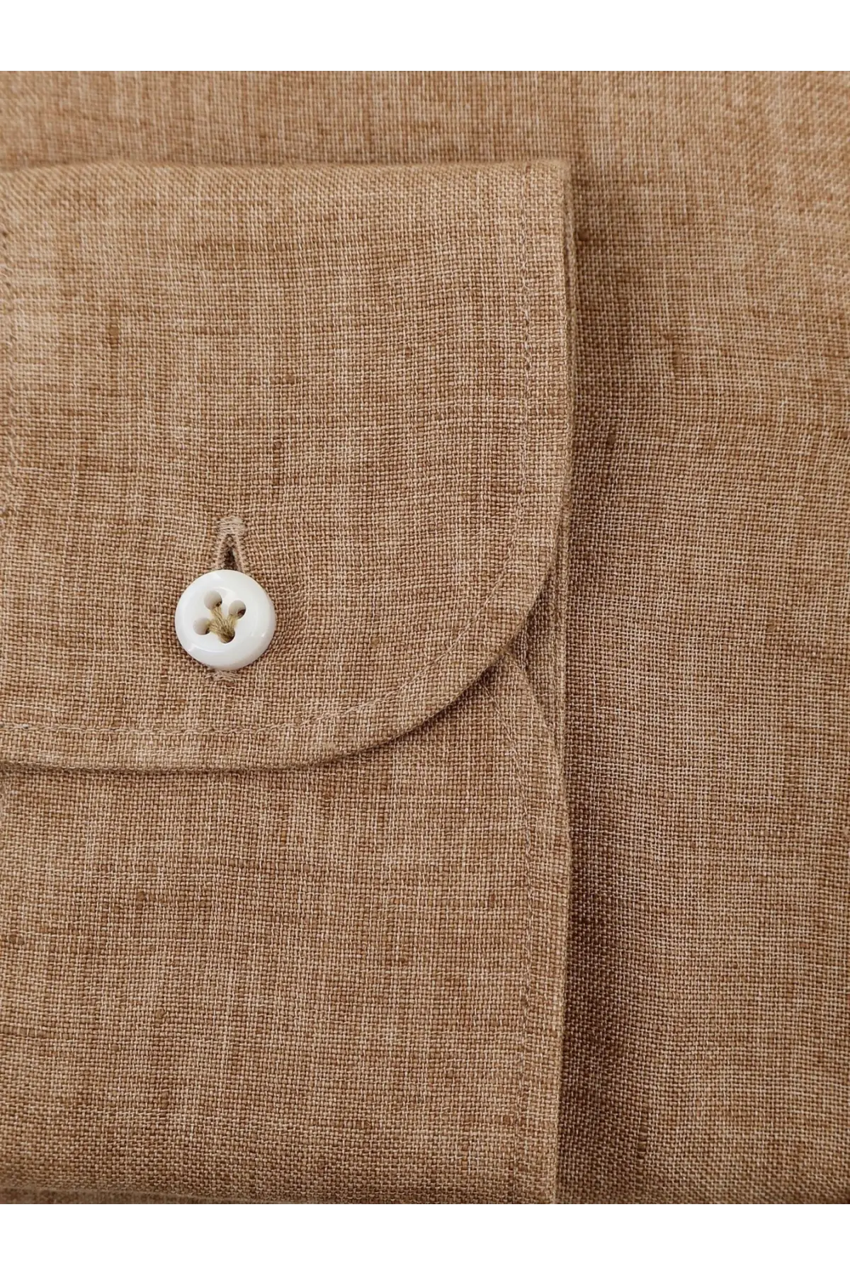 Boss men’s beige linen shirt pocket with white button showcasing tan linen fabric and detailed stitching