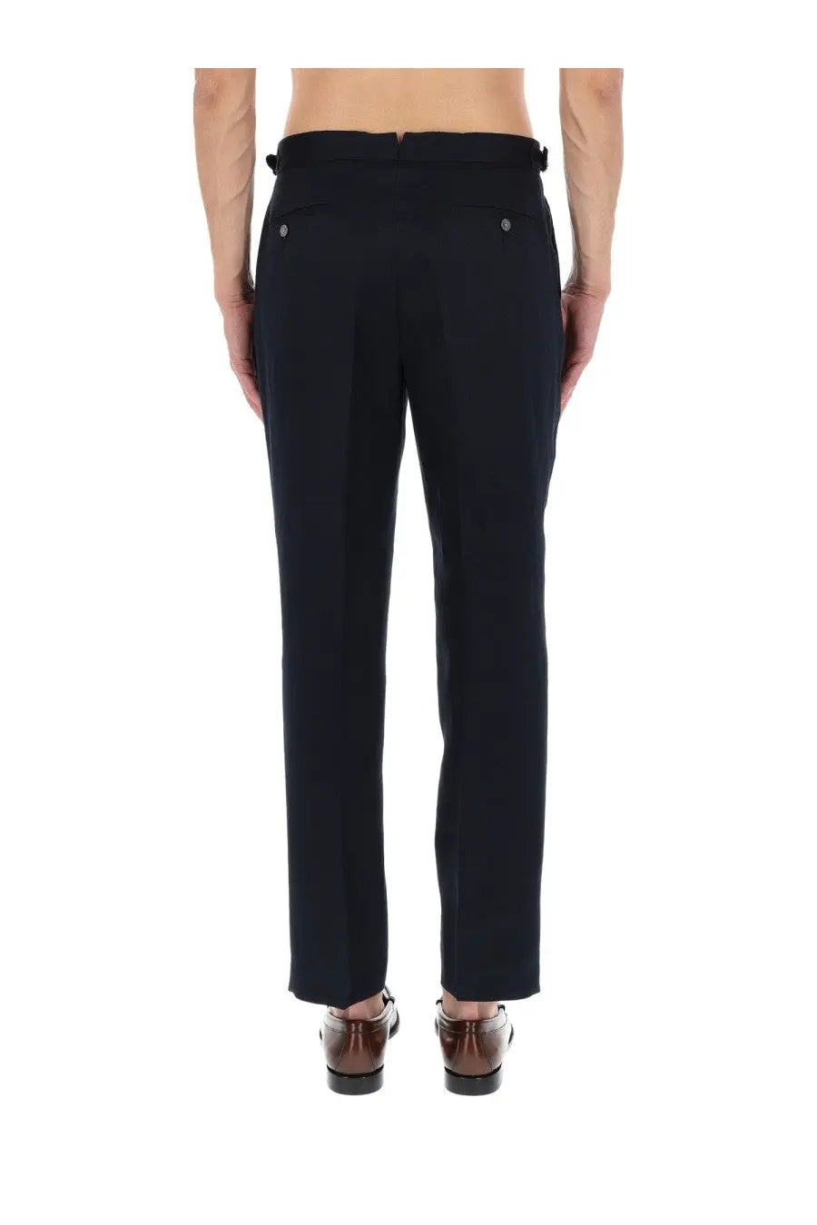 Black tailored men’s trousers by BOSS with a sleek straight-leg cut and subtle back pleats shown from the back side