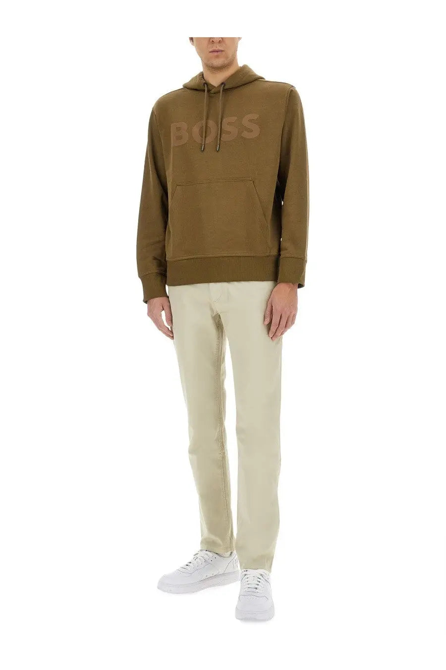 Boss men’s slim fit beige pants paired with an olive green hooded sweatshirt featuring a tonal brand logo on the chest