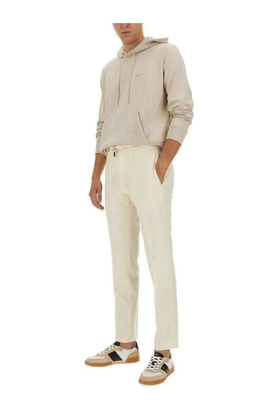 Beige cotton-blend jogger pants with sleek tapered fit and subtle side pockets featured with boss men’s sweatshirt beige