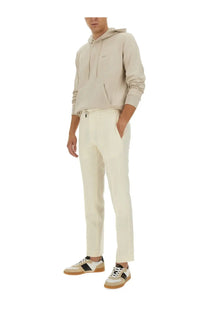 Beige cotton-blend jogger pants with sleek tapered fit and subtle side pockets featured with boss men’s sweatshirt beige