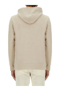 Beige BOSS men’s hooded sweatshirt with soft minimalist design and ribbed cuffs for casual wear