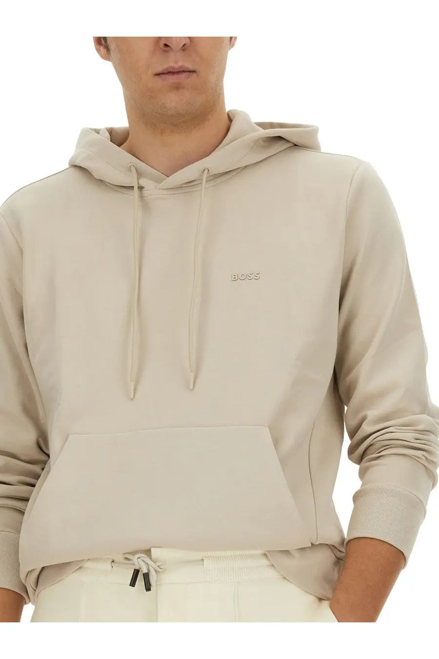 Beige boss men’s hoodie with matching drawstrings and subtle embroidered logo on the chest in soft fabric
