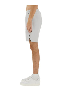 BOSS men’s technical fabric bermuda shorts in light gray with a subtle black side seam zipper detail