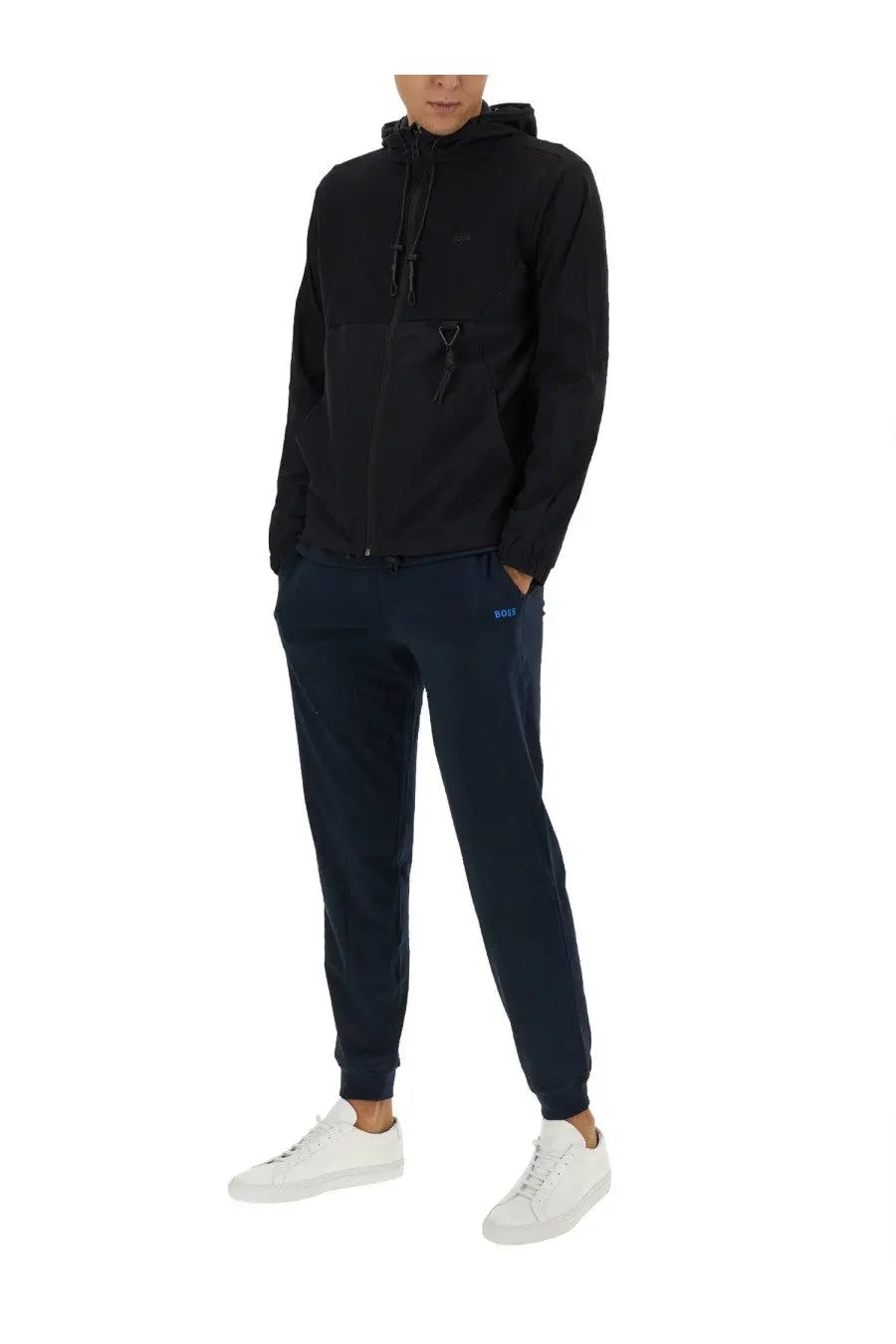 Boss men’s black technical fabric sweatshirt with hood zippered front and side pockets paired with navy joggers