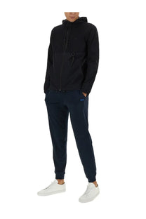 Boss men’s black technical fabric sweatshirt with hood zippered front and side pockets paired with navy joggers
