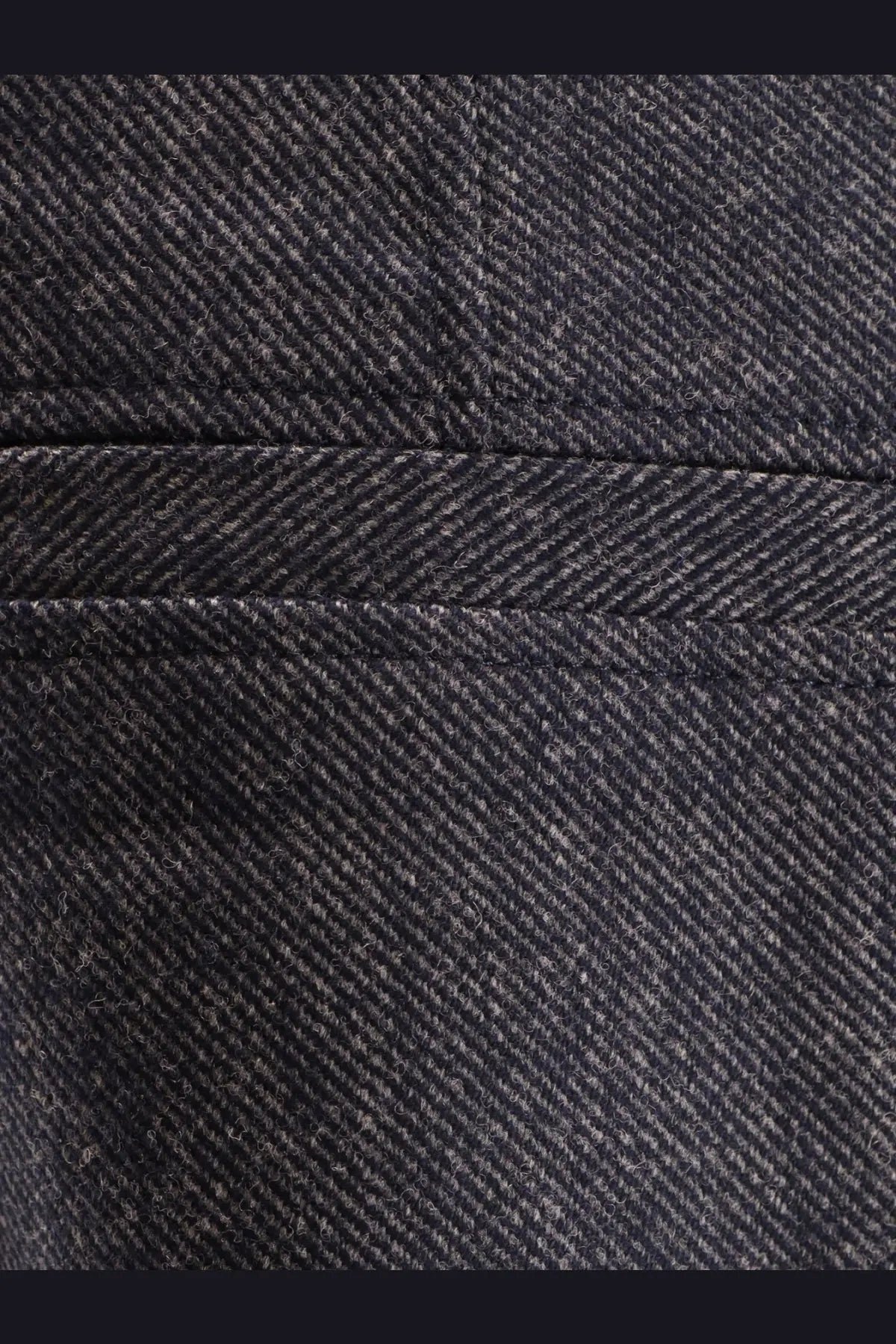 Dark gray herringbone wool fabric with subtle texture and stitching on the seam for boss womens taflong trousers blue