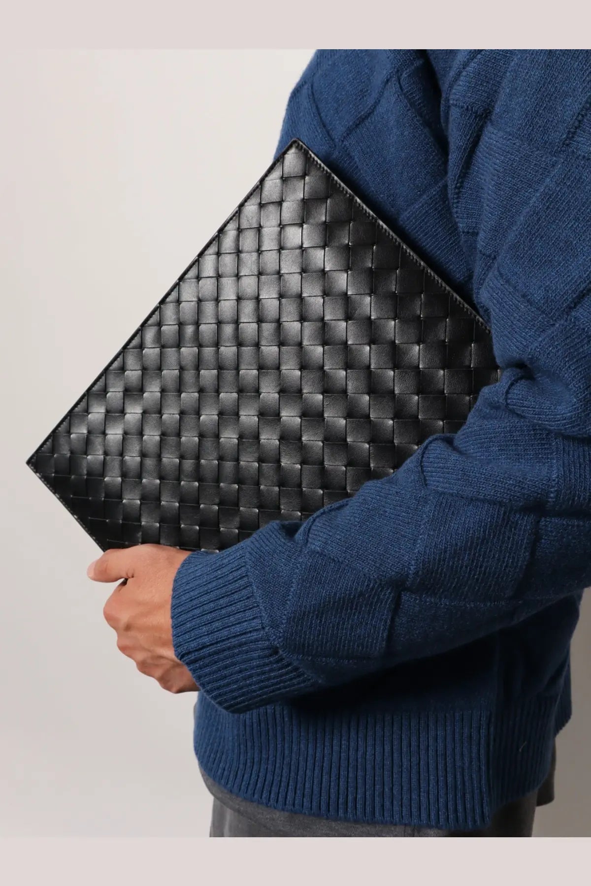 Bottega Veneta men’s avenue leather document case in black with a structured diamond-patterned woven leather design