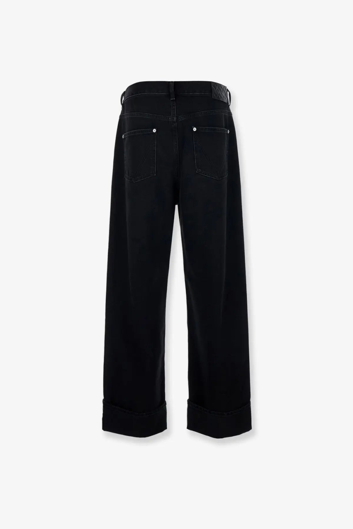 Bottega Veneta men’s black denim trousers with wide legs rolled cuffs and textured belt loop detail