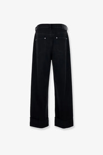 Bottega Veneta men’s black denim trousers with wide legs rolled cuffs and textured belt loop detail