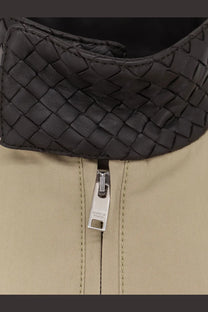 Black woven leather collar with silver zipper pull on Bottega Veneta jacket