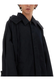 Bottega veneta men’s oversized black trench coat with structured collar and zipper closure front view