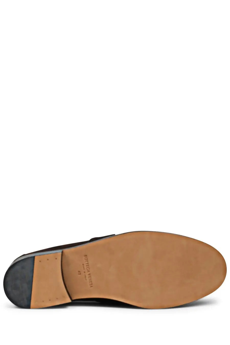 Bottega Veneta men’s black leather loafer with tan rubber sole and black heel shown from the back side