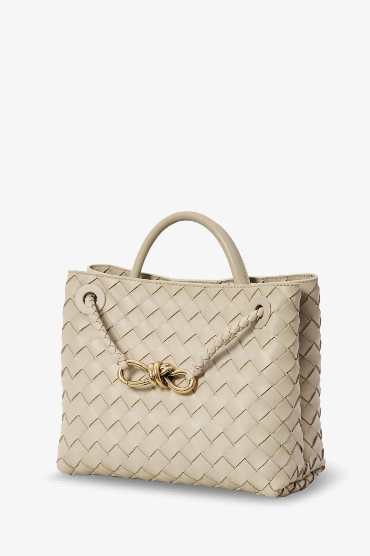 Beige woven leather tote bag with gold-tone bow clasp designed for women by bottega veneta