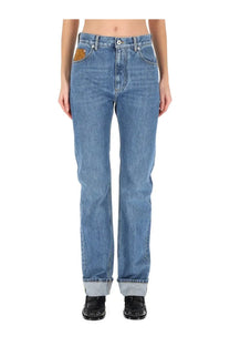 Bottega Veneta women’s indigo vintage straight jeans in medium-wash blue denim with rolled cuffs