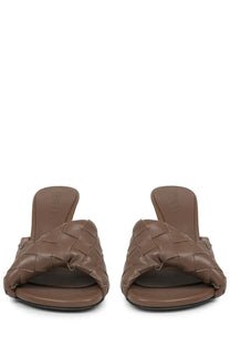 Bottega veneta women’s brown leather mules with a woven strap design for stylish casual wear