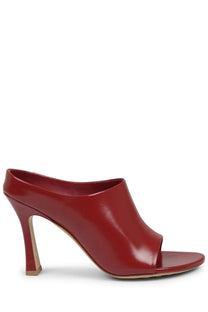 Bottega Veneta women’s mule shoe in frog red patent leather with a minimalist design and slightly squared toe