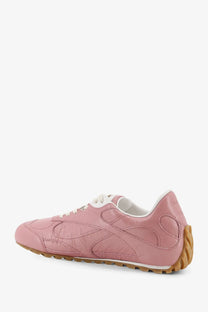 Bottega Veneta women’s orbit flash leather sneakers in beige with pink leather, white laces, and tan rubber sole