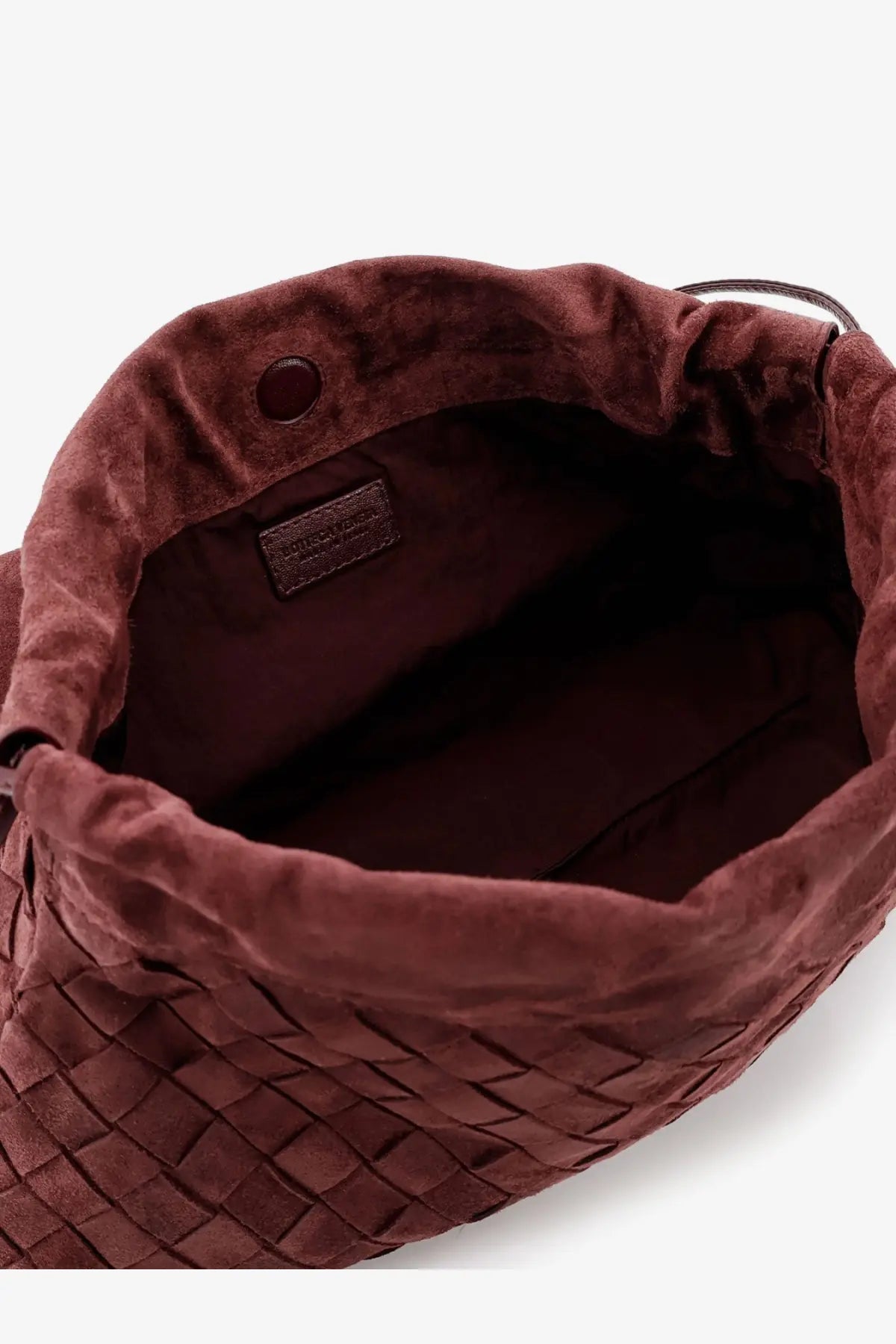 Bottega Veneta women’s deep mahogany suede giorno crossbody bag with a rich burgundy velvet drawstring pouch and leather tag