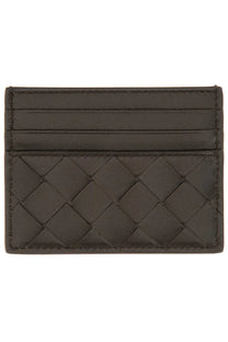 Dark brown leather card holder with woven diamond pattern and stitching by Bottega Veneta for women