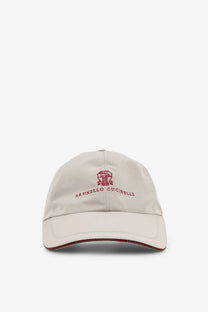Beige brunello cucinelli men’s baseball hat with red embroidered logo and matching trim in brown fabric