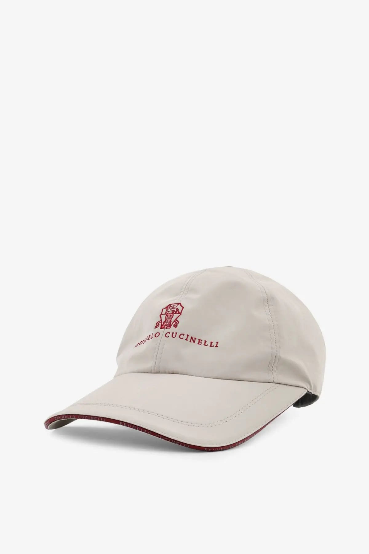 Beige brunello cucinelli men’s baseball cap with red embroidered logo and brand name in brown material