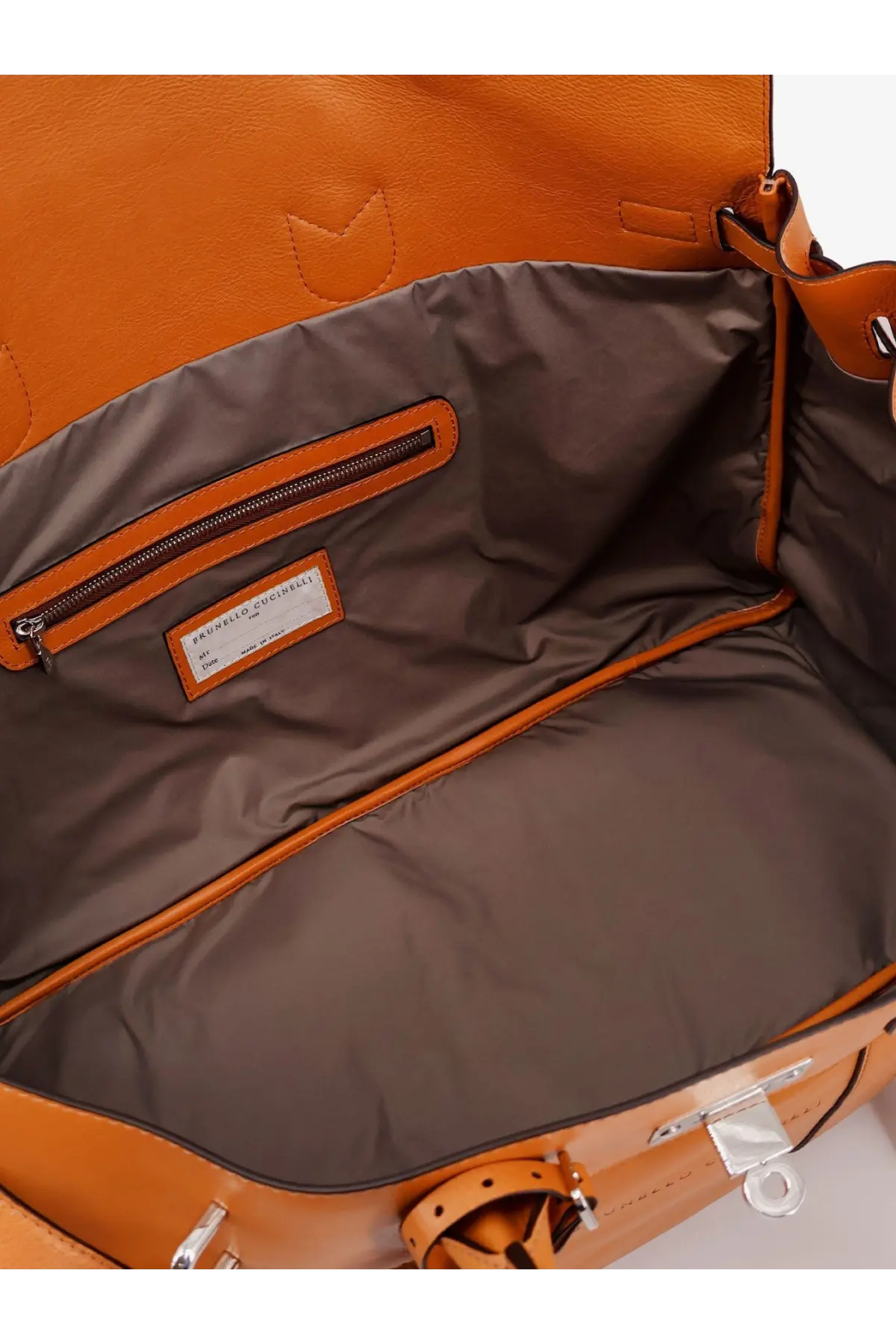 Brunello Cucinelli men’s leather travel bag white with orange leather exterior, brown interior lining, and silver-tone hardware
