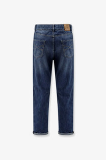 Dark blue Brunello Cucinelli men’s leisure fit straight-leg cotton jeans with rolled cuffs