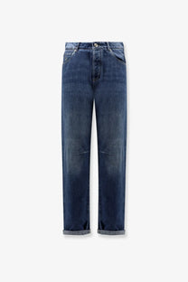 Brunello Cucinelli men’s leisure fit blue cotton jeans with dark wash straight-leg cut and rolled cuffs