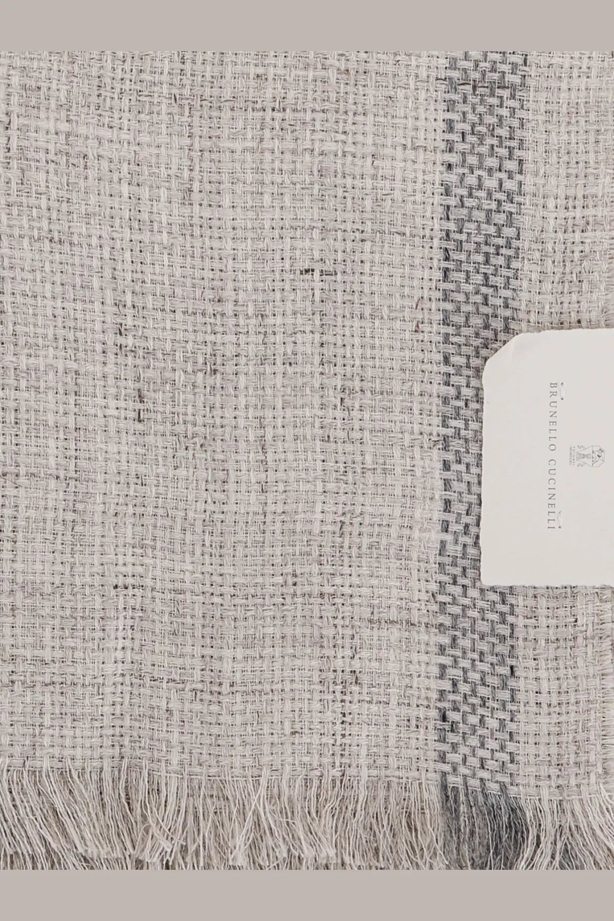 Brunello Cucinelli men’s linen scarf in light gray with a subtle plaid pattern and fringed edges