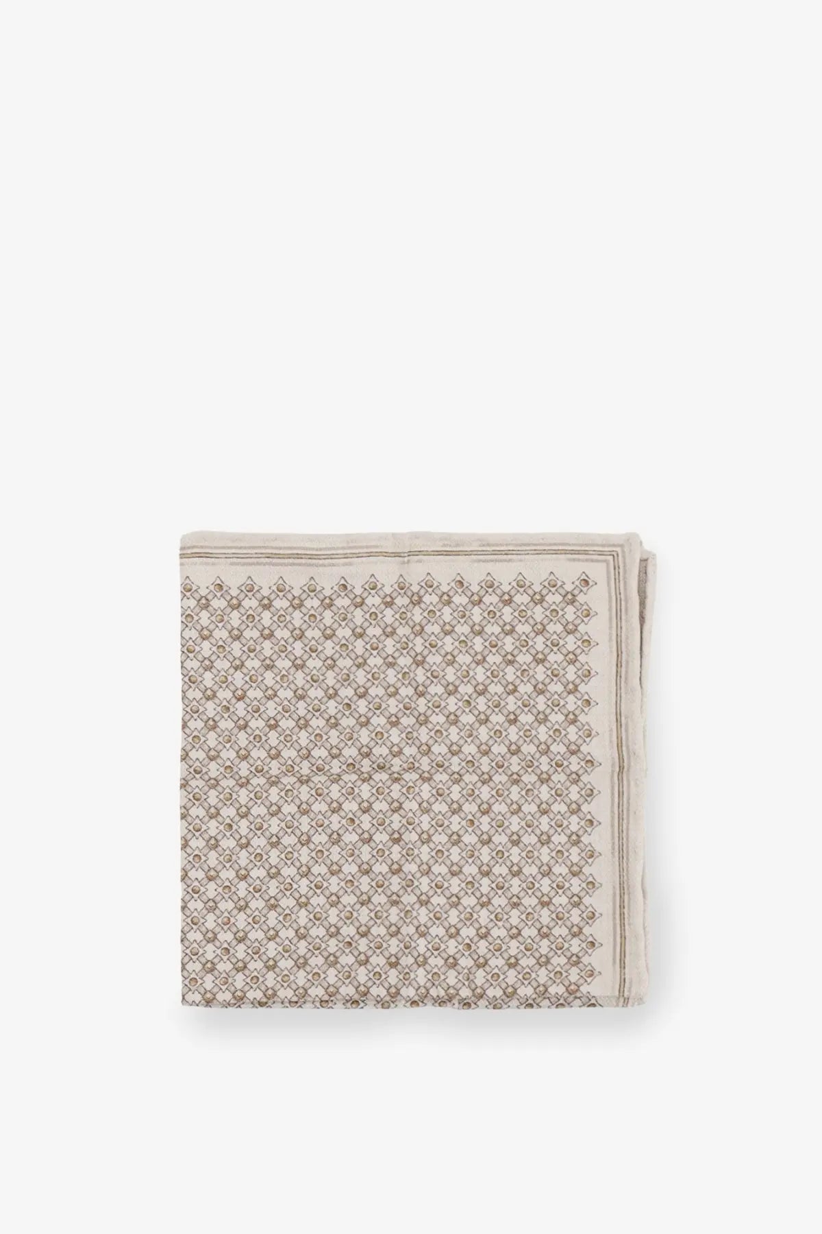 A neatly folded brunello cucinelli men’s silk pocket square in beige with a subtle gray geometric pattern