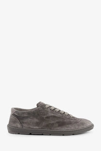 Brunello Cucinelli men’s grey suede low-top sneaker with matching laces and textured rubber sole