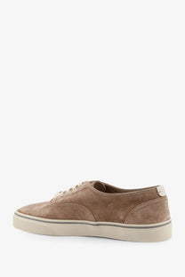 Brunello Cucinelli men’s tan suede low-top sneaker with white laces and cream rubber sole