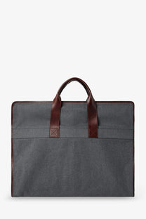 Brunello Cucinelli men’s technical fabric and leather garment bag in grey with brown leather handles and trim
