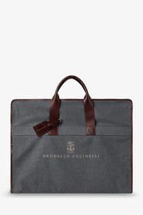 Brunello cucinelli men’s gray canvas garment bag with brown leather handles and trim made of technical fabric and leather