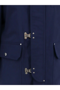 Dark blue brunello cucinelli men’s trench coat with silver metal buckles and button details in water resistant fabric