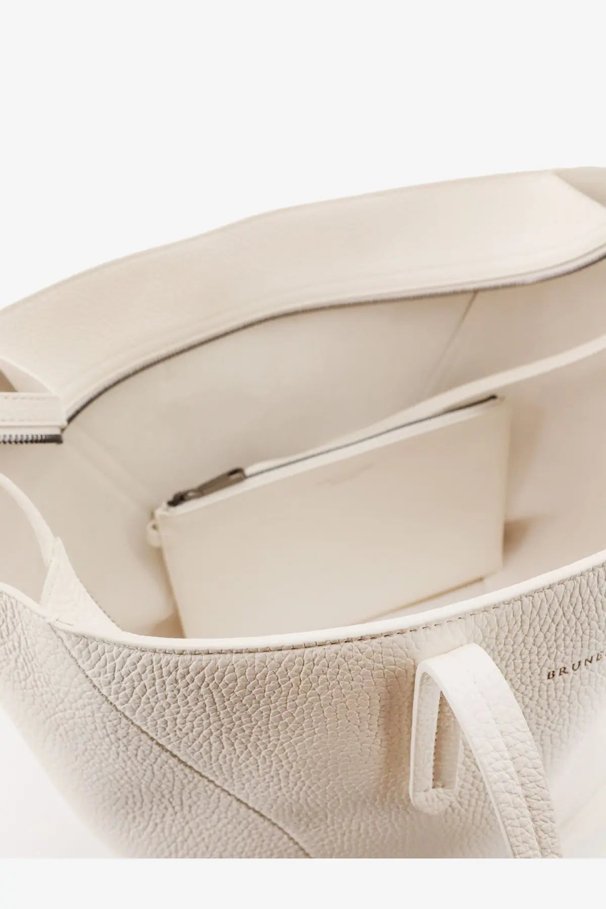 Brunello Cucinelli women’s cream-colored pebbled leather tote bag with minimalist design and subtle brand embossing
