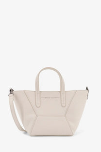 Brunello Cucinelli women’s white leather tote bag with geometric panels and silver hardware in off-white leather
