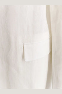 Brunello Cucinelli women’s white cotton blazer pocket with crisp linen texture and tailored stitching detail