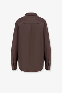 Brunello Cucinelli women’s brown long-sleeved cotton blend shirt with classic collar and subtle back pleats shown from back